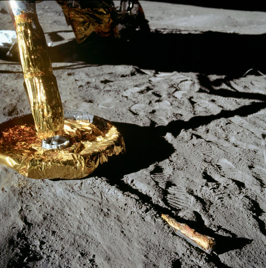 Tranquility Base — Apollo 11 image: NASA — Buzz Aldrin standing beside the US flag at Tranquility Base, photographed by Neil Armstrong, July 20, 1969. (NASA, public domain)