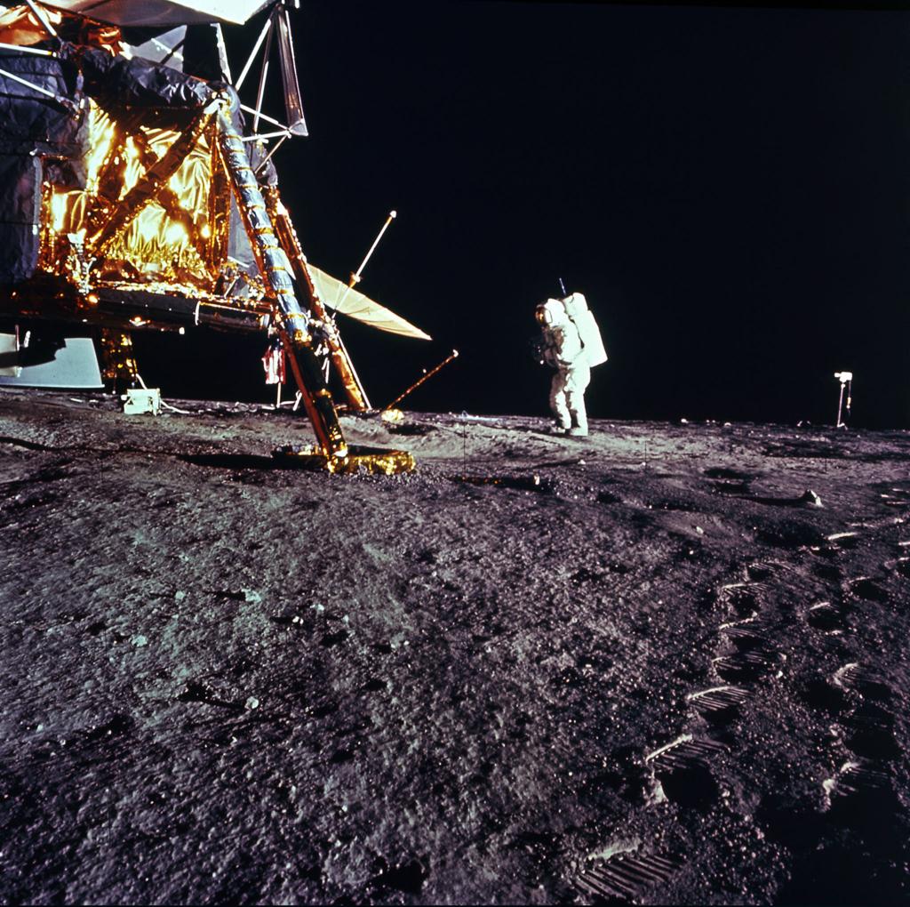 Apollo 12 photograph 1: NASA — Alan Bean descends the lunar module ladder, Apollo 12, November 19, 1969. (NASA, public domain)