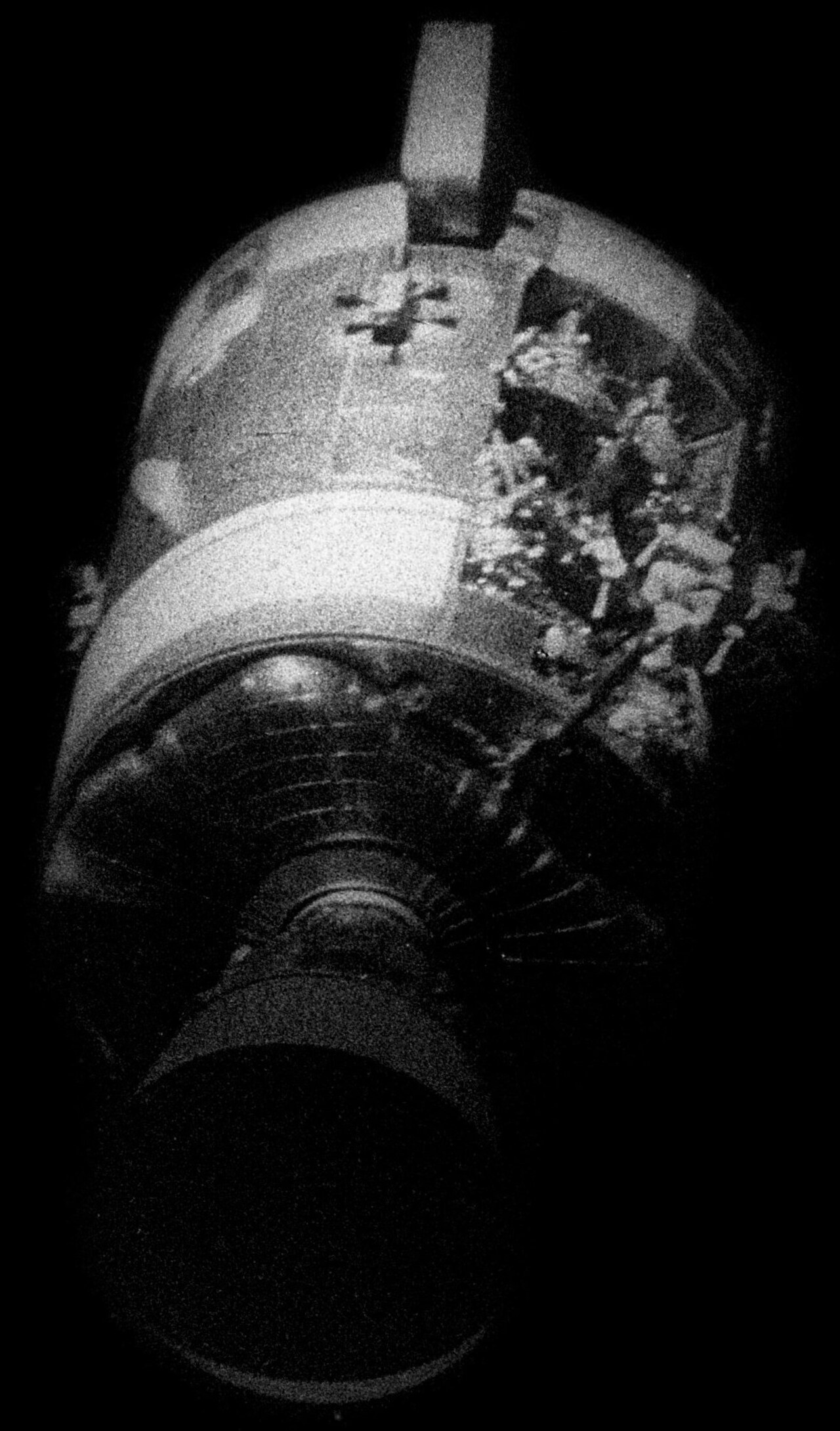 Apollo 13 photograph 1: NASA — Apollo 13 damaged Service Module (SM) photographed after separation, showing oxygen tank explosion damage, April 17, 1970. The explosion forced mission ABORT; no lunar landing was made. (NASA, public domain)