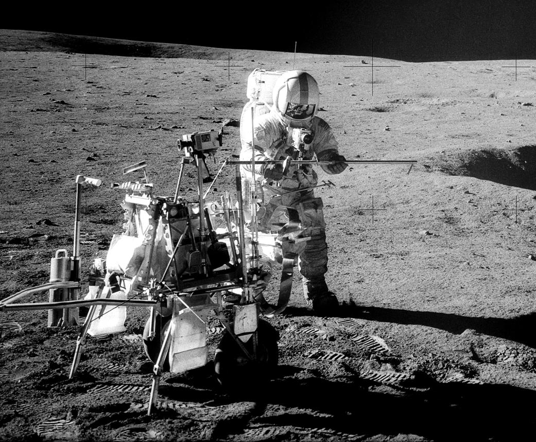 Apollo 14 photograph 2: NASA — Apollo 14 astronauts on the lunar surface near the Modular Equipment Transporter (MET), Fra Mauro, February 5–6, 1971. (NASA, public domain)