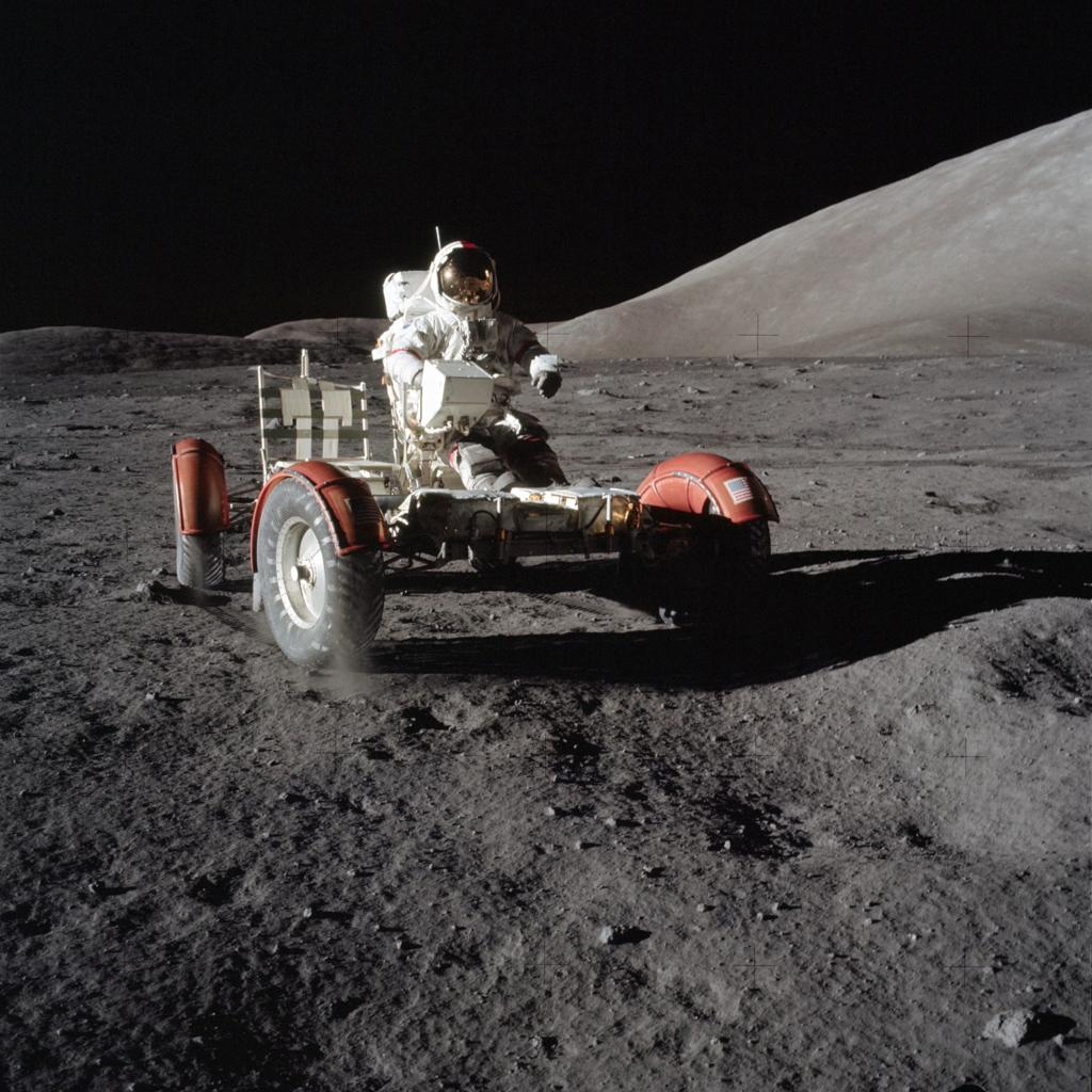 Apollo 17 photograph 2: NASA — Harrison Schmitt sampling the lunar surface in the Taurus–Littrow valley, Apollo 17, December 1972. (NASA, public domain)
