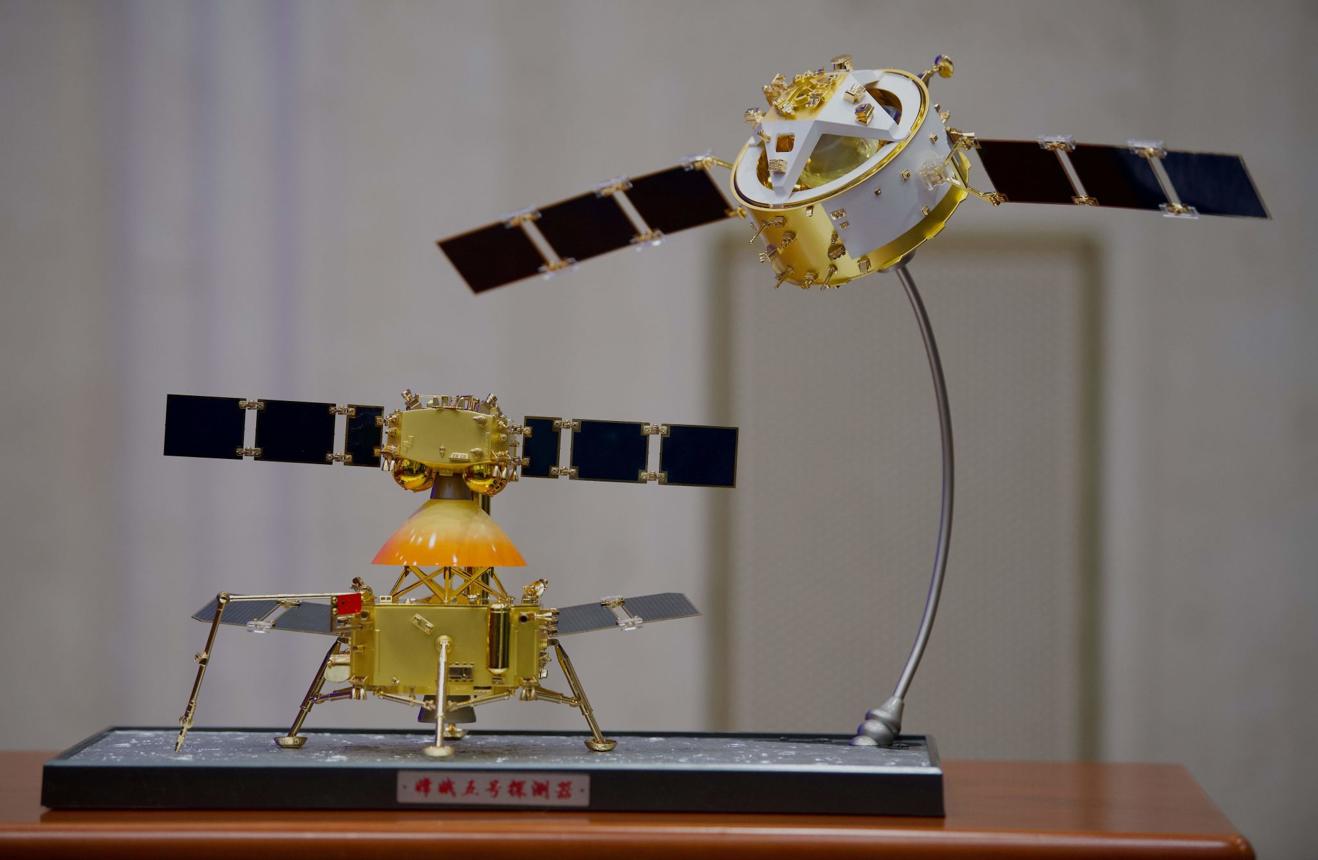 Chang'e 5 photograph 1: CNSA — Chang'e 5 lander and ascent vehicle on the surface of Mons Rümker, Oceanus Procellarum, December 2020. (CNSA, public domain)