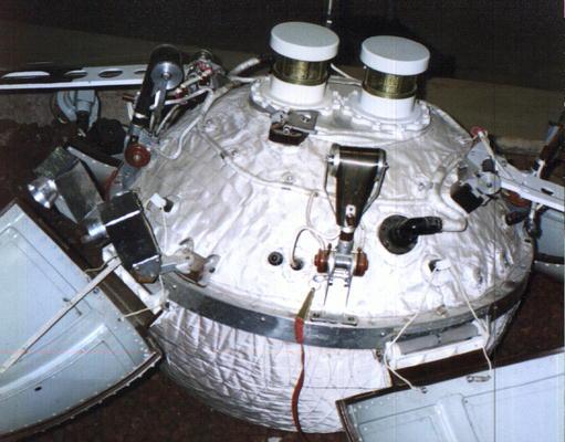 Luna 13 photograph 1: Wikimedia Commons — Luna 13 spacecraft model. Landed December 24, 1966, Oceanus Procellarum. (Public domain / Soviet Space Program)