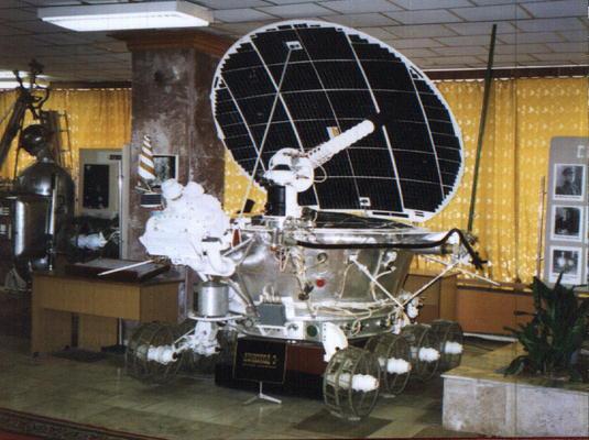 Luna 21 photograph 2: Wikimedia Commons — Lunokhod 2 model showing improved design over Lunokhod 1 with additional cameras. (Public domain)