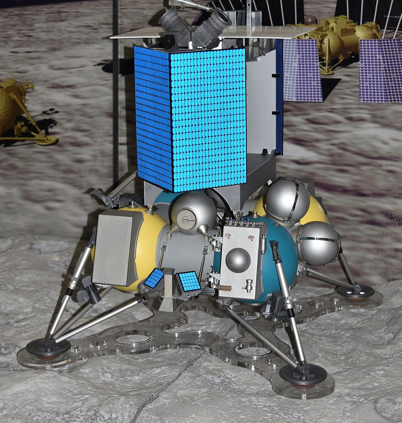 Luna 25 photograph 1: Roscosmos — Luna 25 (Luna-Glob Lander) spacecraft model. Russia's first lunar mission since 1976. The mission suffered a thruster anomaly during pre-landing orbit correction on August 19, 2023, and crashed into the Moon. No landing was achieved. (Roscosmos, public domain)